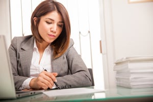 bigstock-Female-Lawyer-Signing-Document-81719783