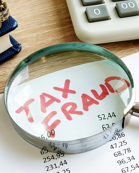bigstock-Tax-Fraud-Written-On-The-Audit-264240826