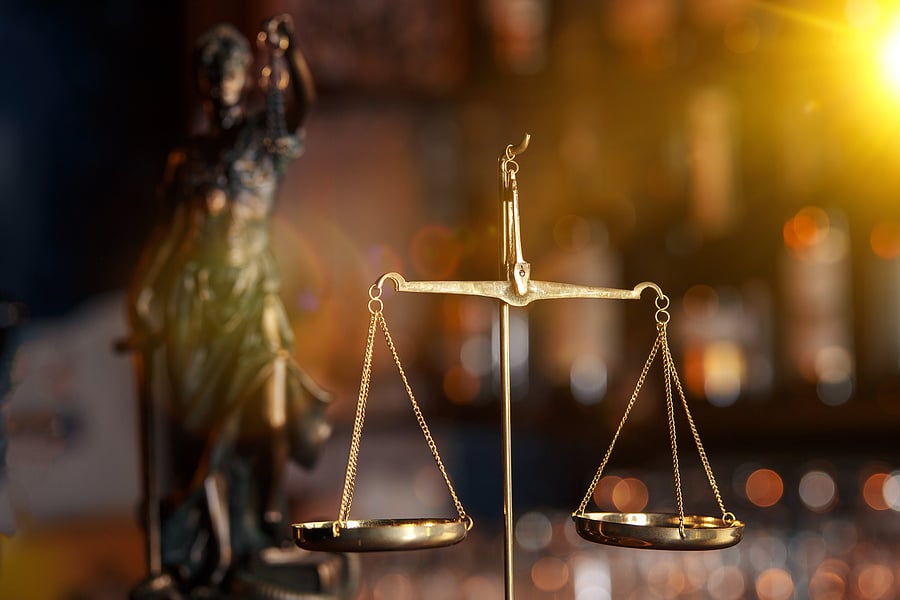 bigstock-The-Hard-Work-Of-An-Asian-Lawy-268058890